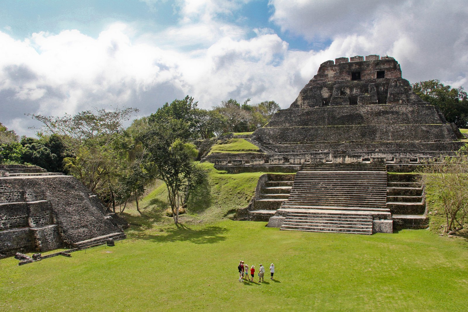 El Castillo pyramid at Xunantunich Maya ruins rising above the jungle canopy in Cayo District, Belize